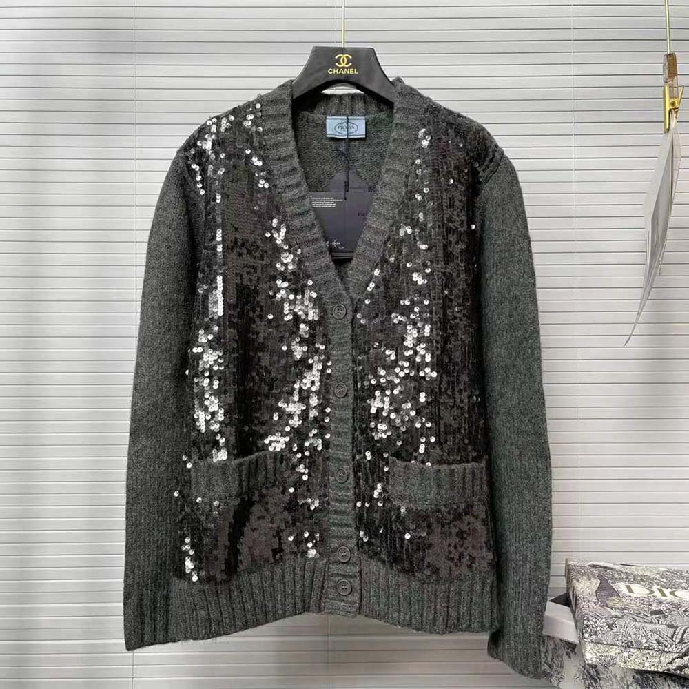 Close-up detail of silver sequins and wool texture on Prada cardigan