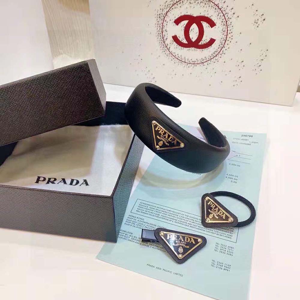 Side angle showing wraparound fit of Prada Women Wide Nylon Headband black