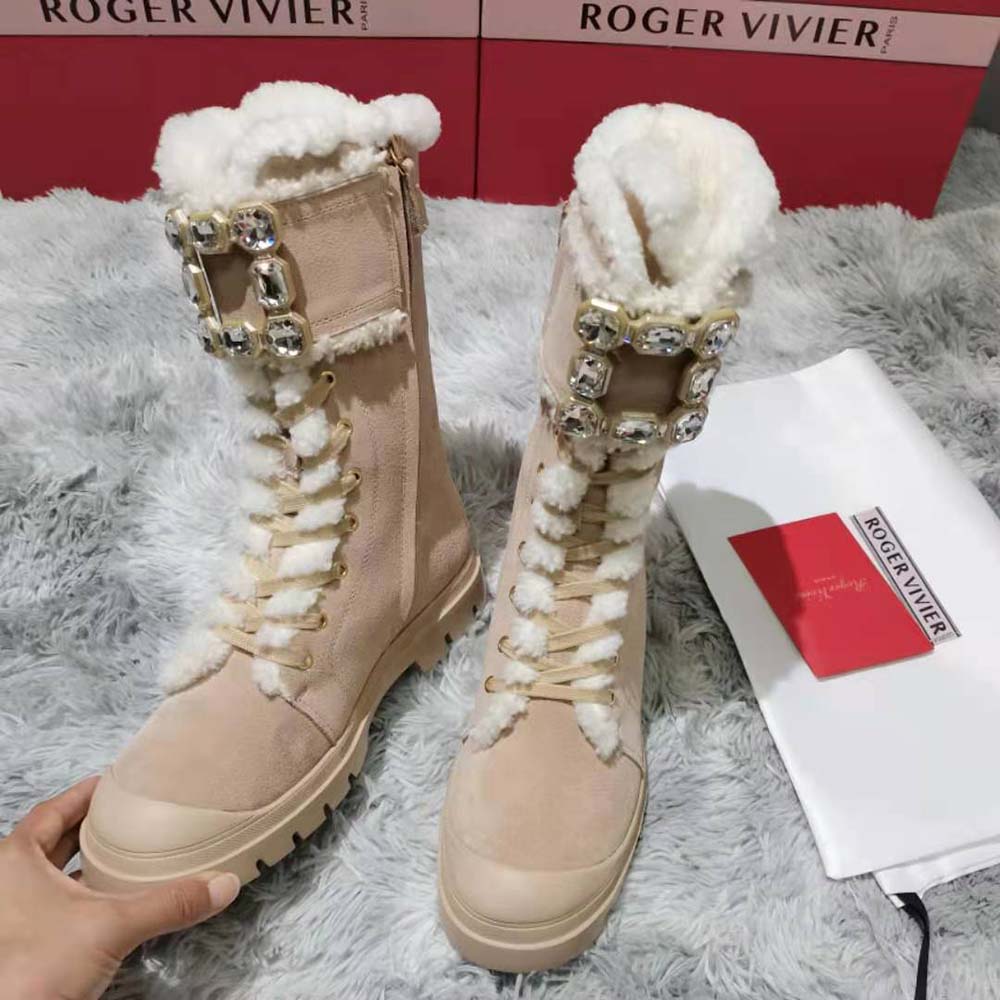 Top-down angle showing lace-up and shearling lining of Roger Vivier booties