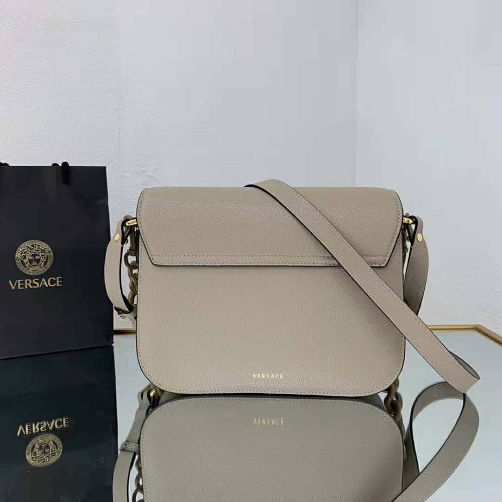 Side angle of Versace Women La Medusa Shoulder Bag-Sandy highlighting smooth sandy leather