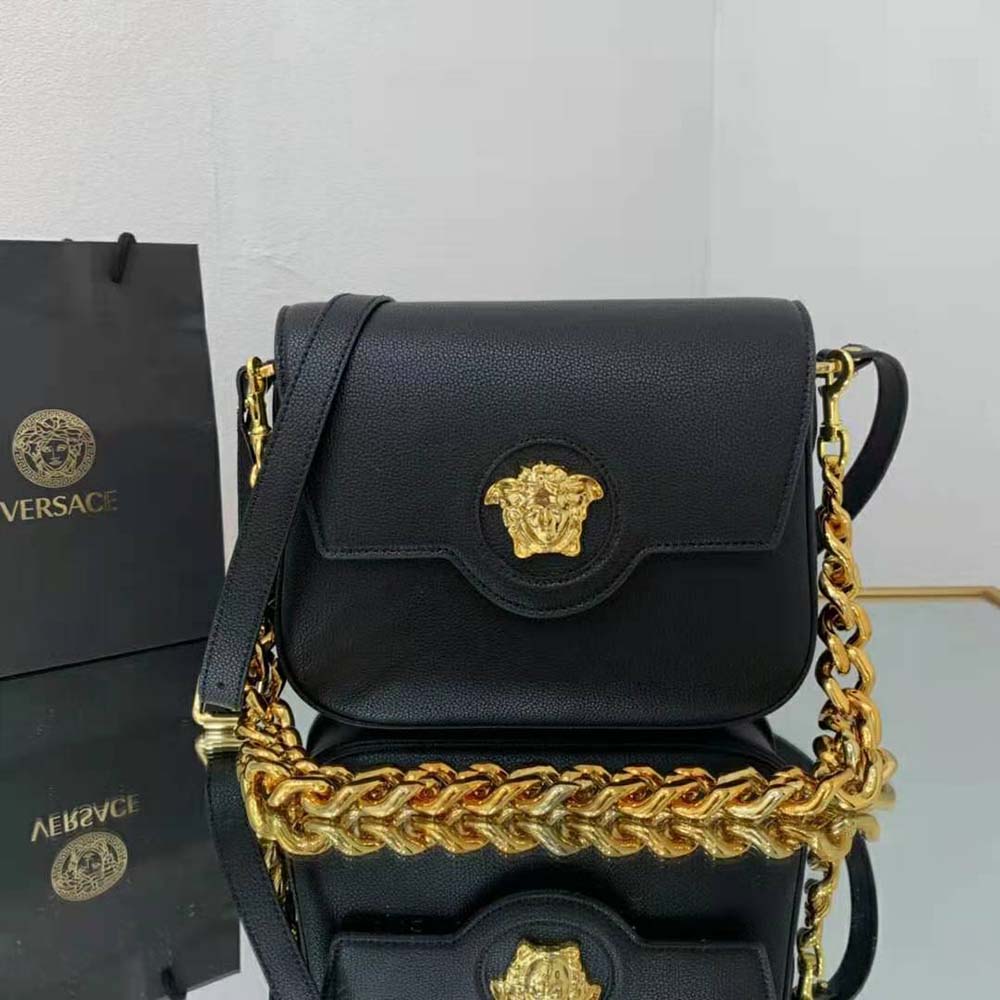Close-up of Medusa head hardware on Versace Women La Medusa Shoulder Bag-Black