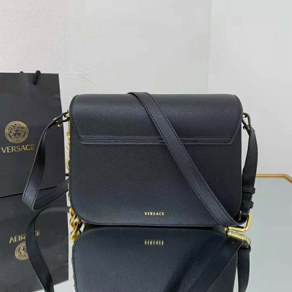 Side angle showing adjustable strap on Versace Women La Medusa Shoulder Bag-Black