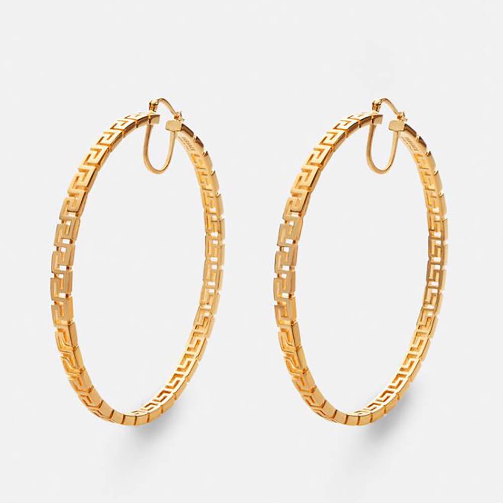 Close-up of Versace Women Large Greca Hoop Earrings-Gold showing engraved Greca detail