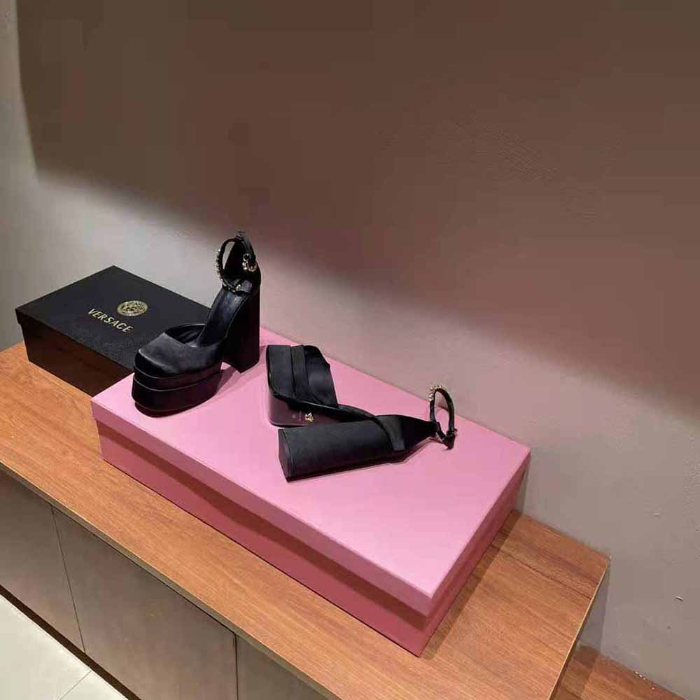 Top angle of black leather and ankle strap on Versace Women Medusa Aevitas Platform Pumps
