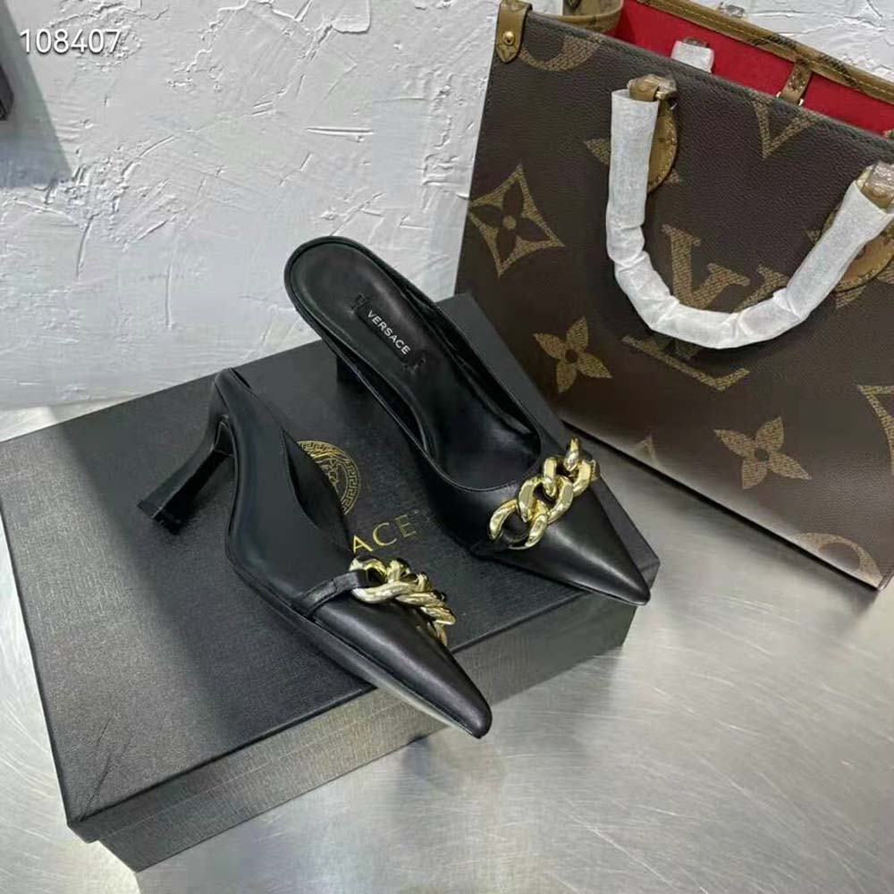 Top shot showing black nappa leather texture on Versace Women Medusa Chain Nappa Leather Mules-Black