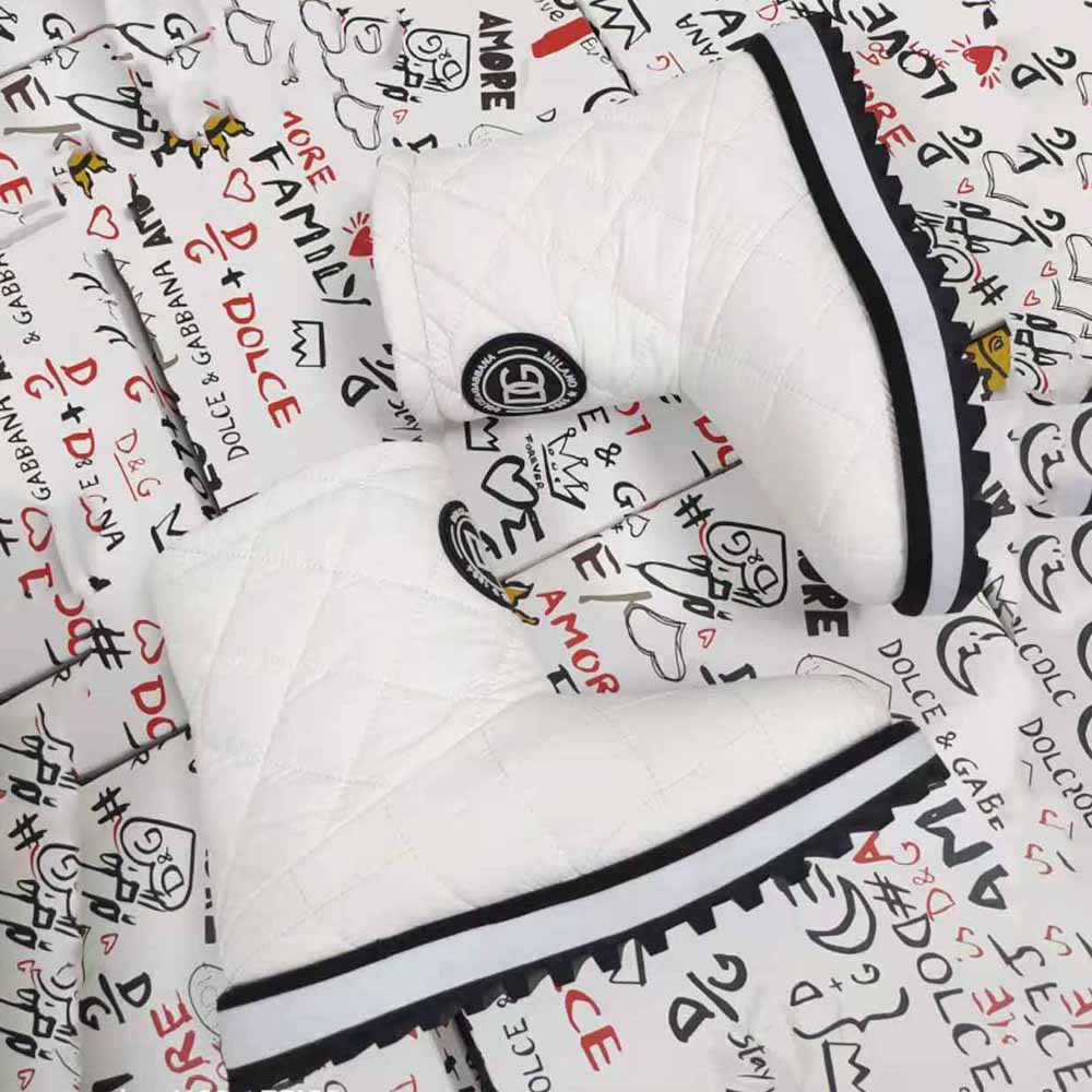 Top angle showing zip closure on Dolce Gabbana D&G White ankle boots