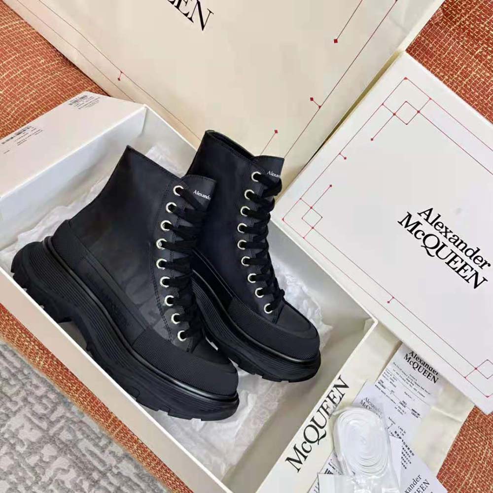 Sole view showing tread pattern on Alexander Mcqueen Women Tread Slick Boot Black Polyfaille