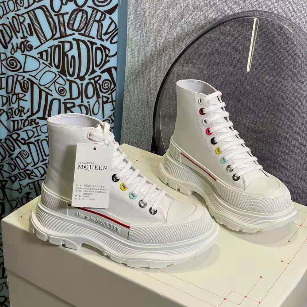Close-up on multicolour eyelet detailing of Alexander Mcqueen Women Tread Slick Boot
