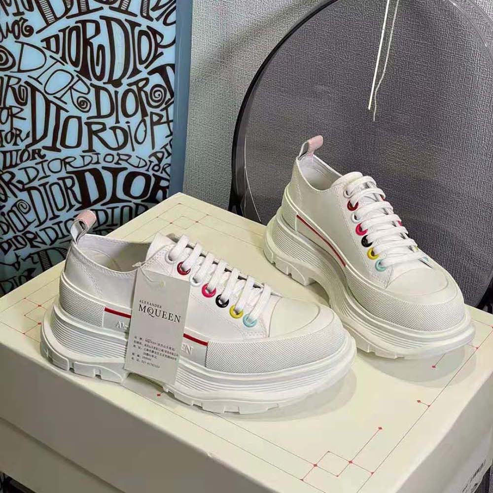 Sole detail of Alexander Mcqueen Women White Canvas Tread Slick Lace Up shoes