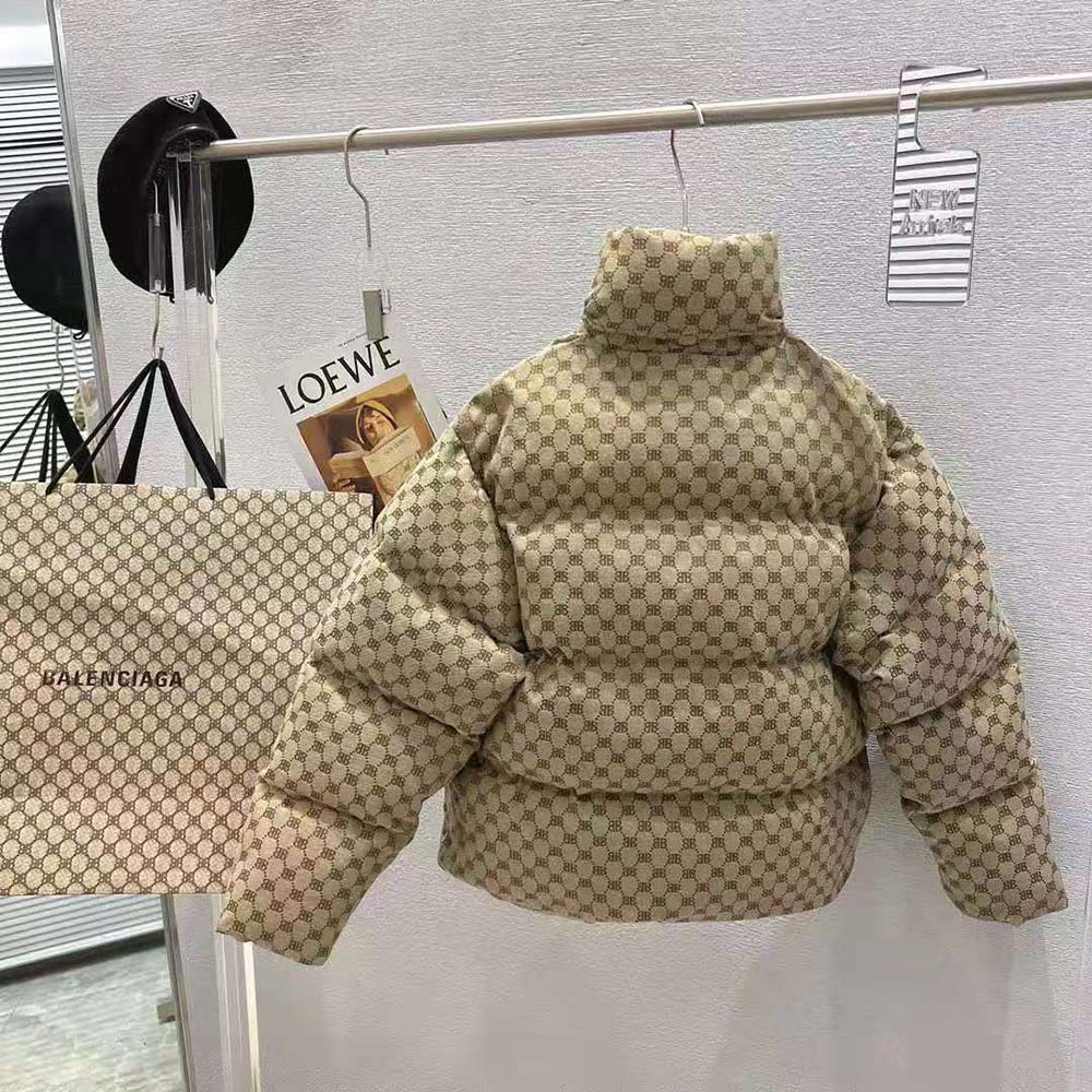 Side angle showing oversized silhouette of Balenciaga Men Hacker BB Puffer coat