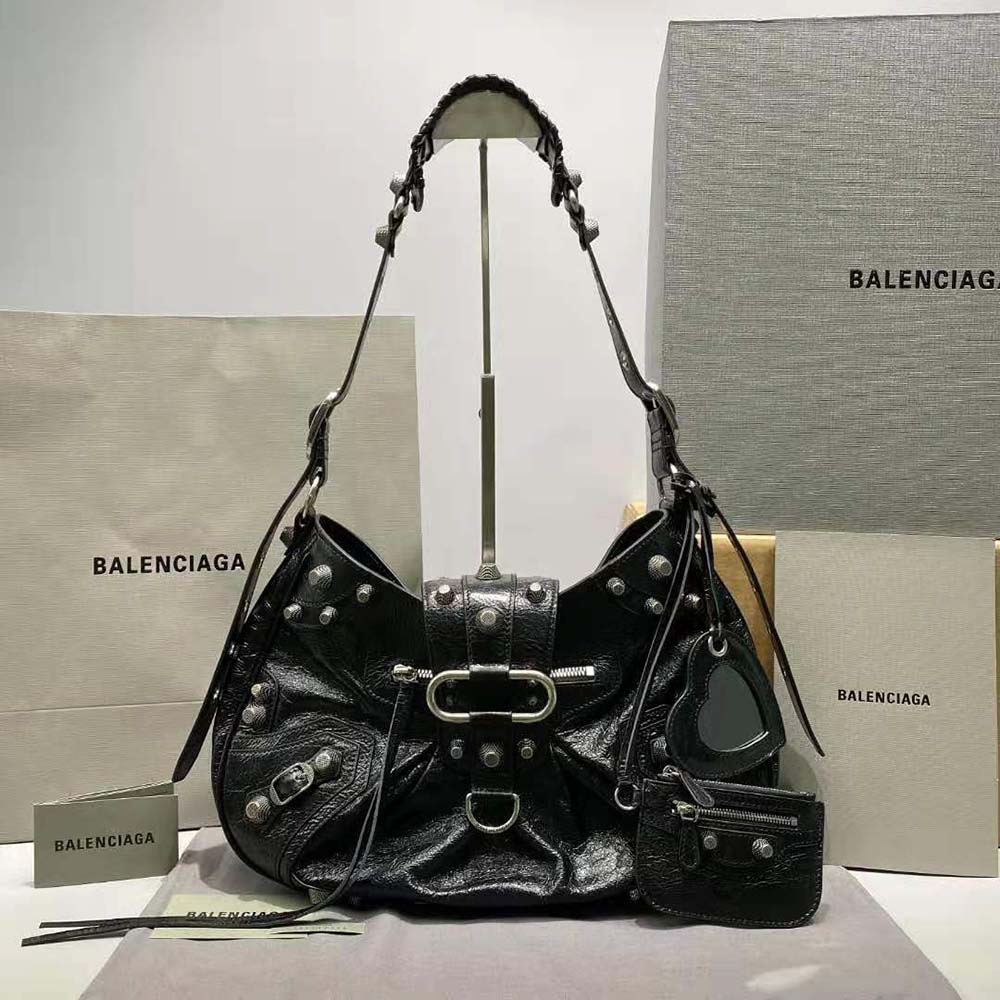 Close-up of antique silver chain strap on Balenciaga Le Cagole bag