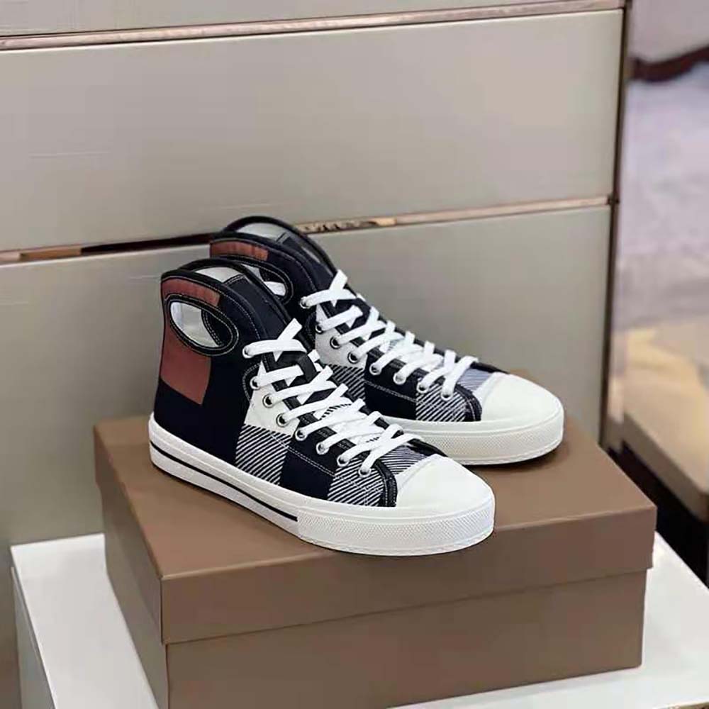 Close-up of porthole eyelet detail on Burberry Men Sneakers