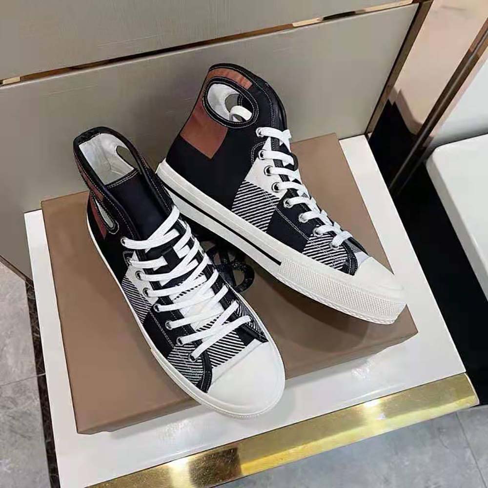 Top angle showing Burberry check print and lace-up closure on sneakers