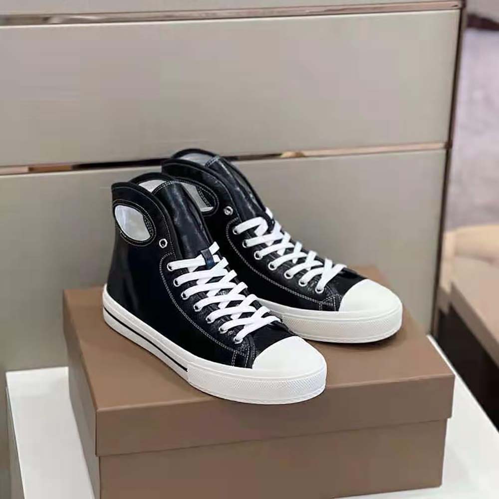 Top-down view showing laces and black leather on Burberry Men Porthole Detail Sneakers