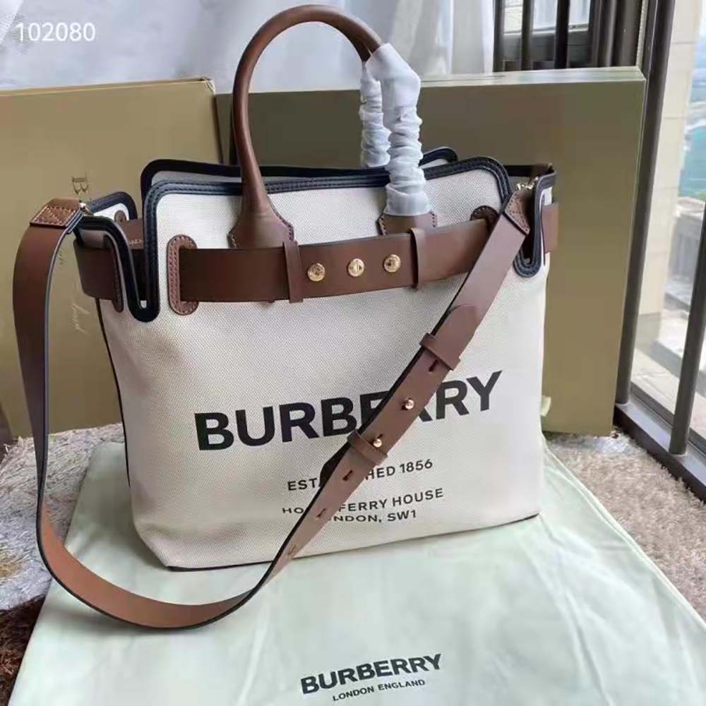 Side angle showing spacious interior and structured silhouette of Burberry tote