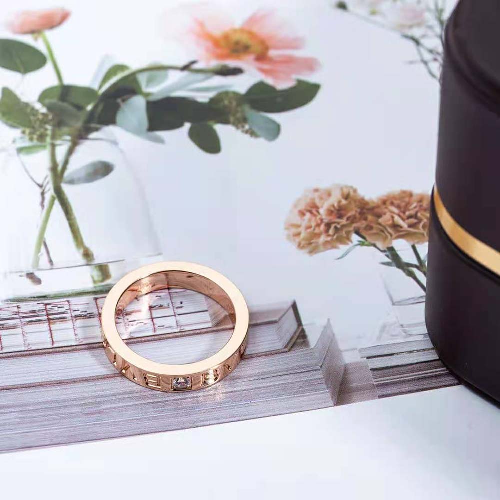 Side profile showing polished band and diamond detail on Bvlgari women’s rose gold ring