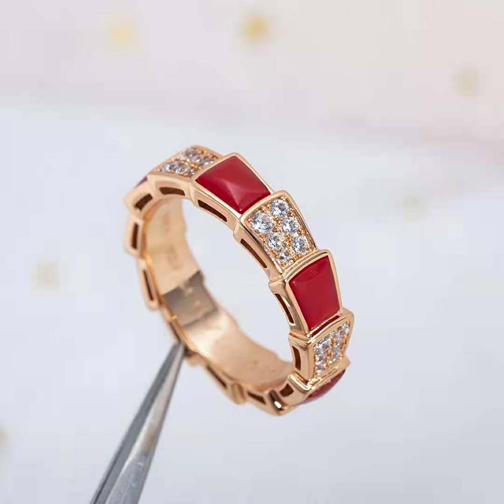 Model wearing Bvlgari Women Serpenti Viper Band Ring highlighting rose gold shine
