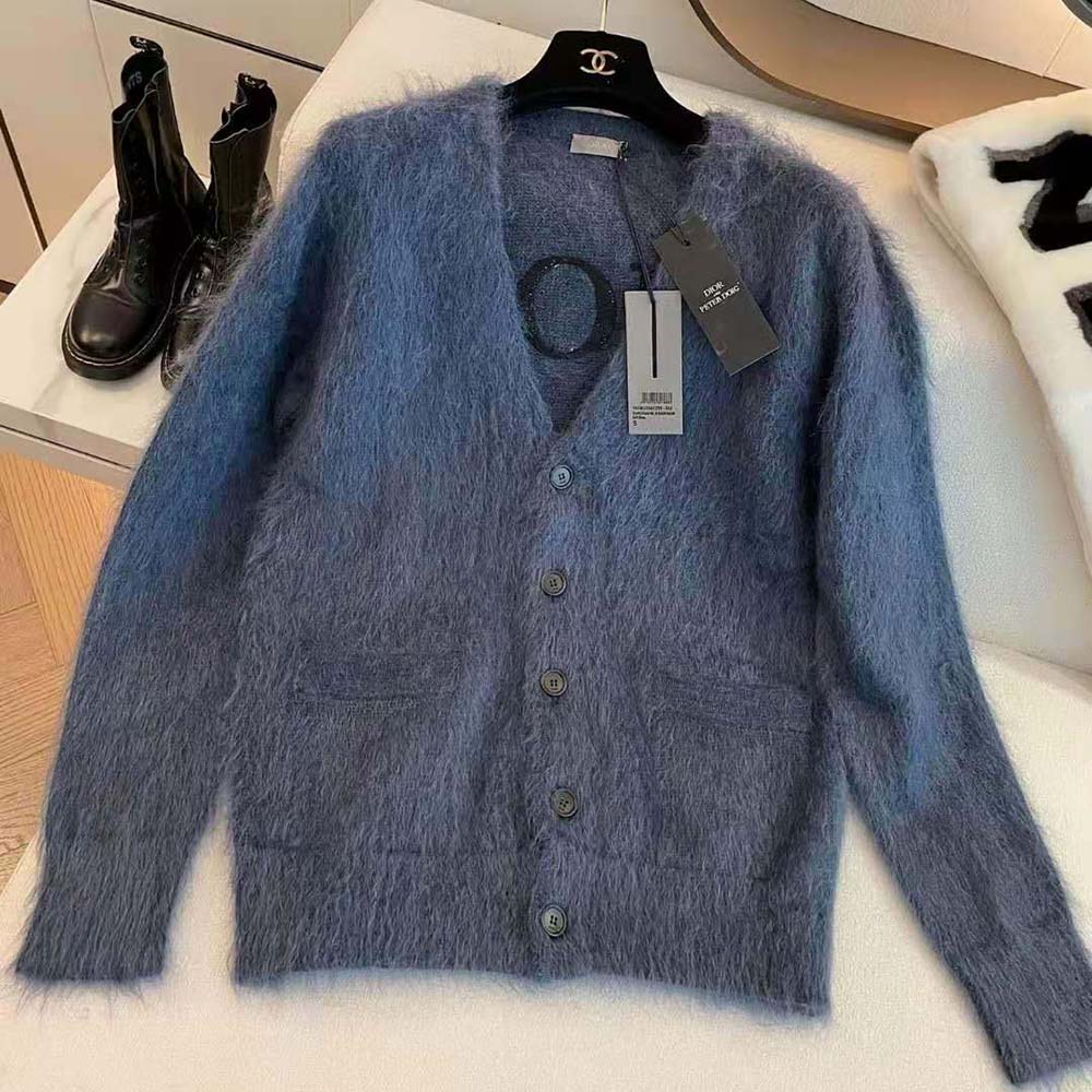 Side angle highlighting Dior embossed buttons on Peter Doig Cardigan Blue