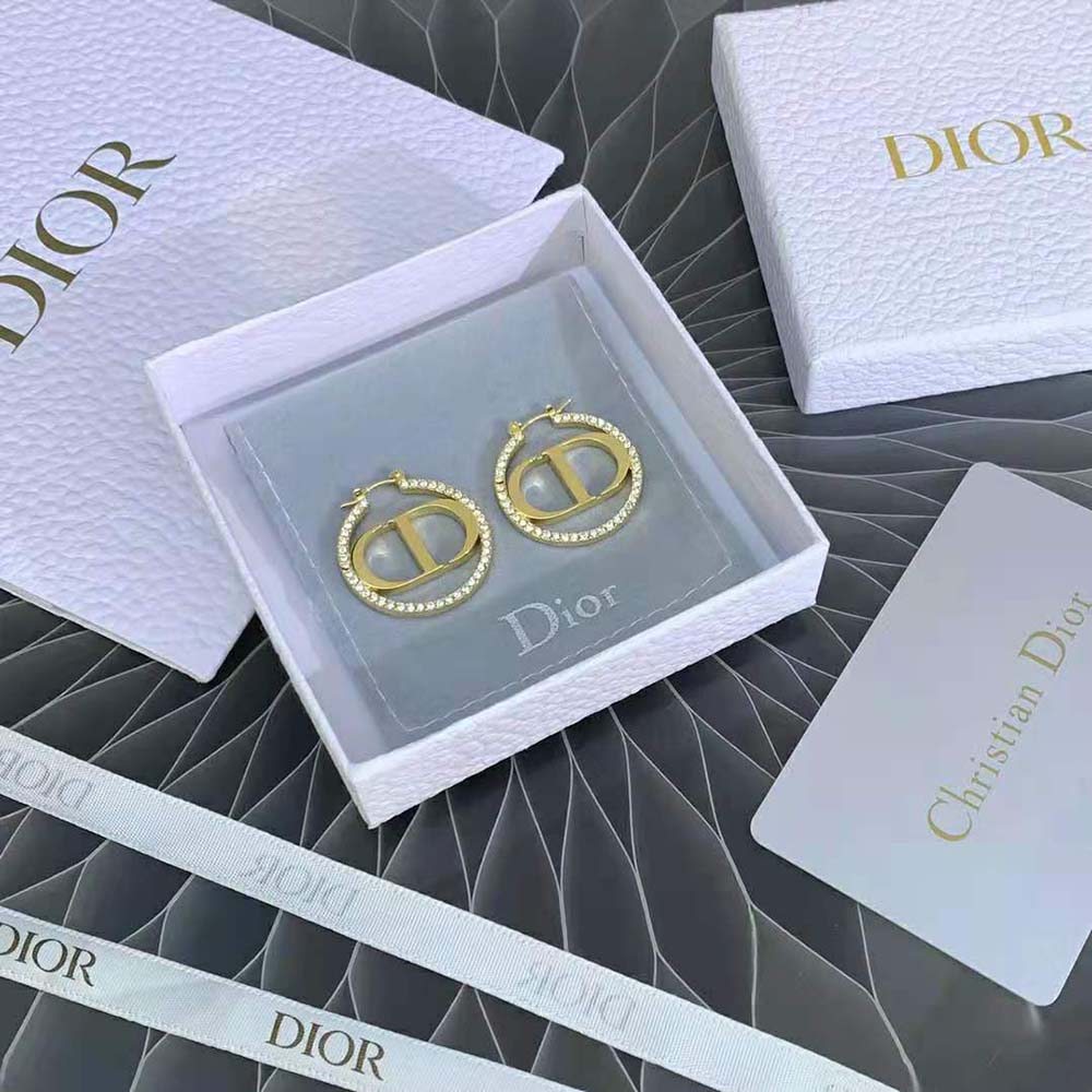 Side view of Dior Women 30 Montaigne Earrings in gold-finish metal