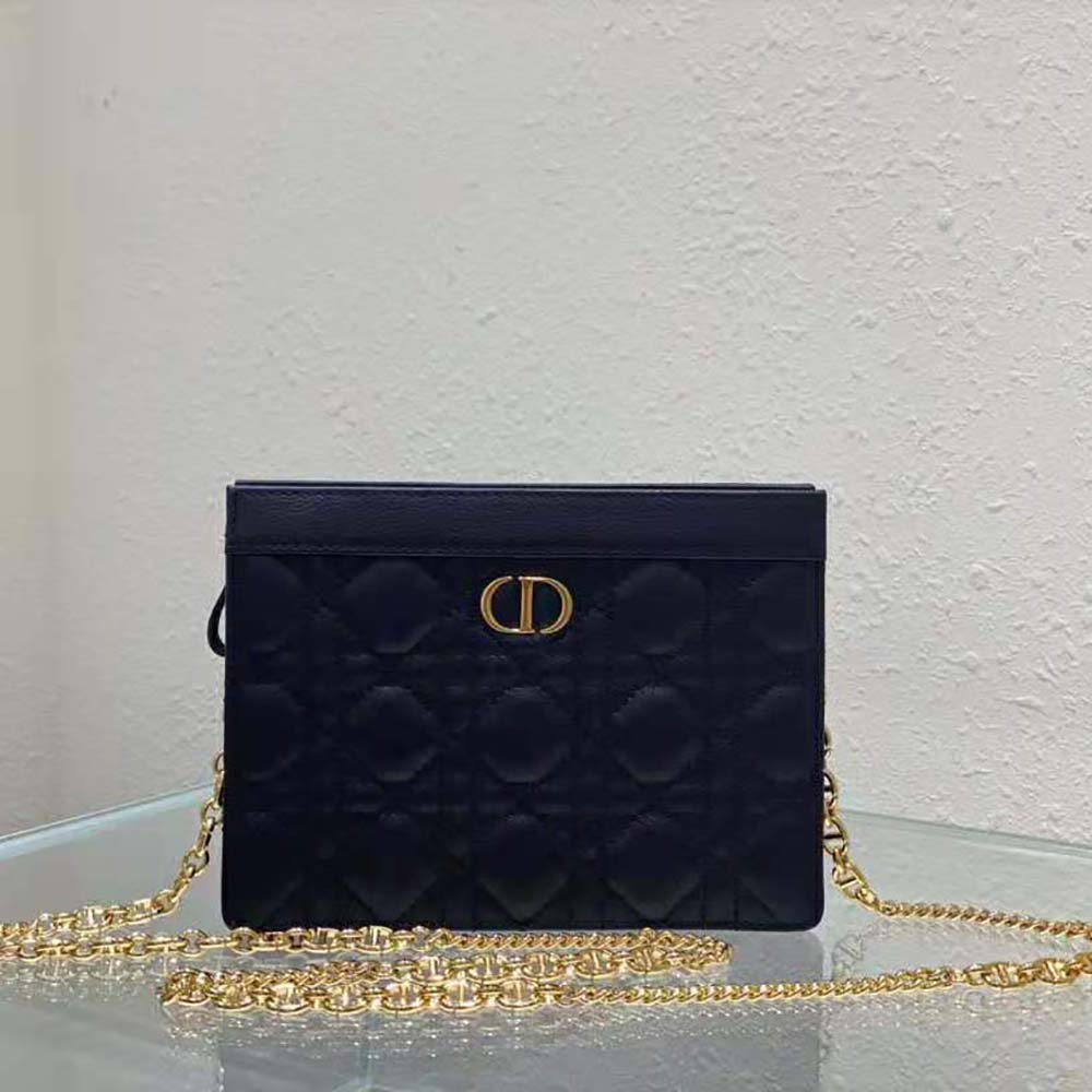 Close-up of silver-tone chain and zipped closure on Dior Caro pouch