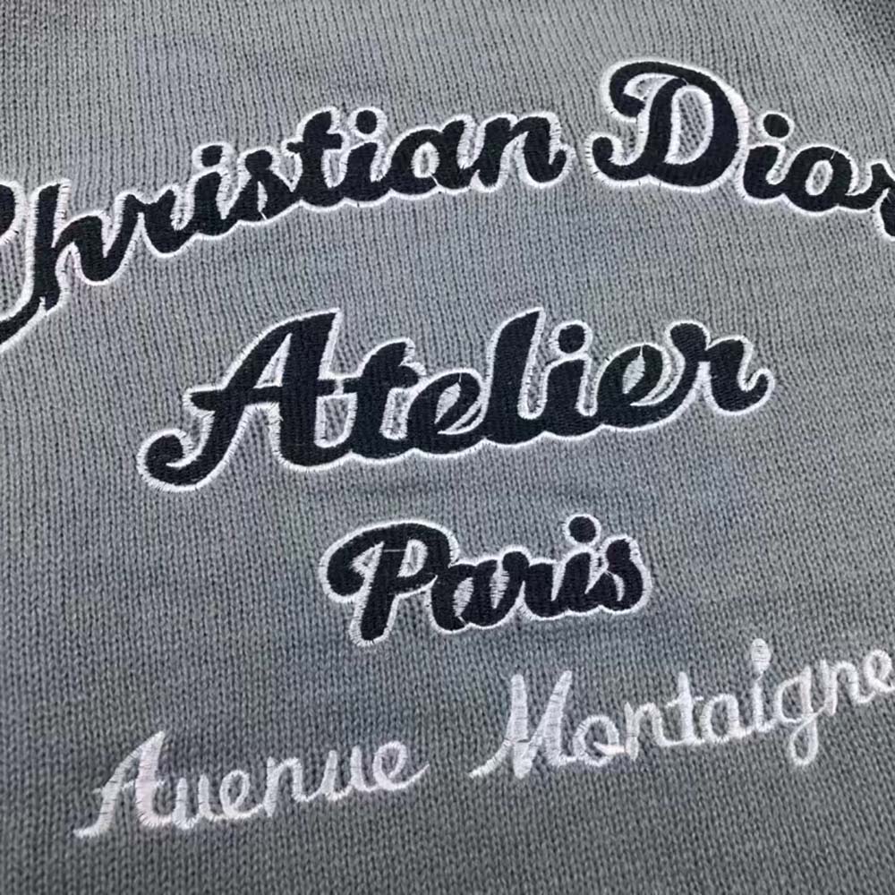 Side angle showing relaxed fit of Dior Women Christian Dior Atelier Sweater