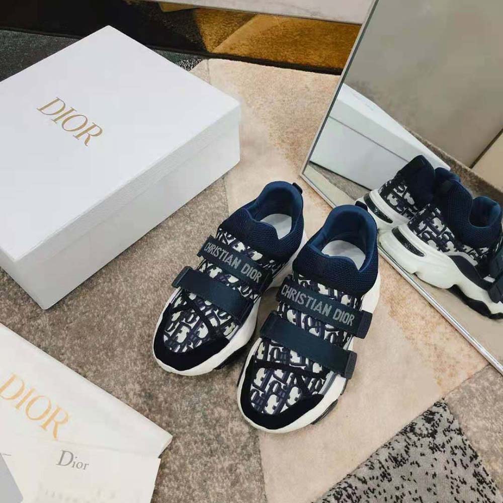 Close-up of deep blue Dior Oblique pattern on Dior Women D-Wander Sneaker