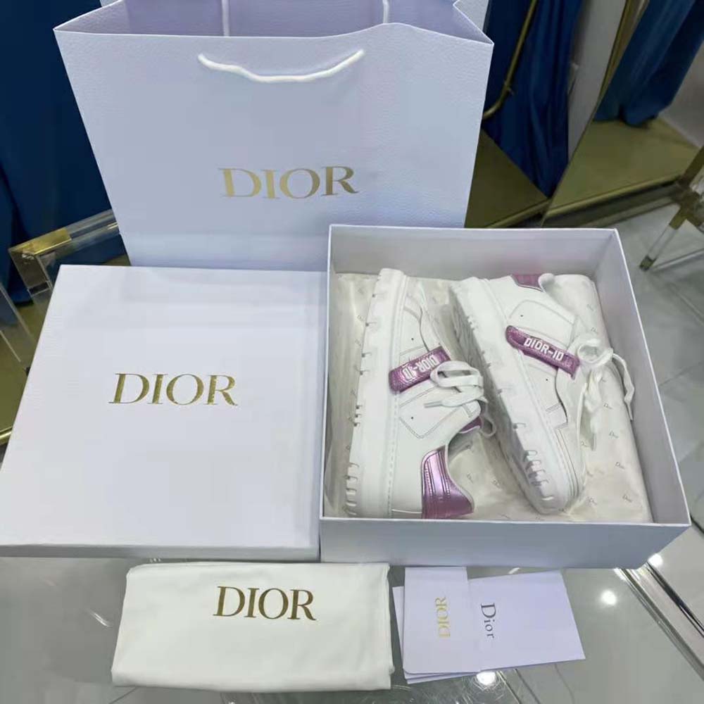 Close-up of metallic pink and white calfskin on Dior Women Dior-id Sneaker
