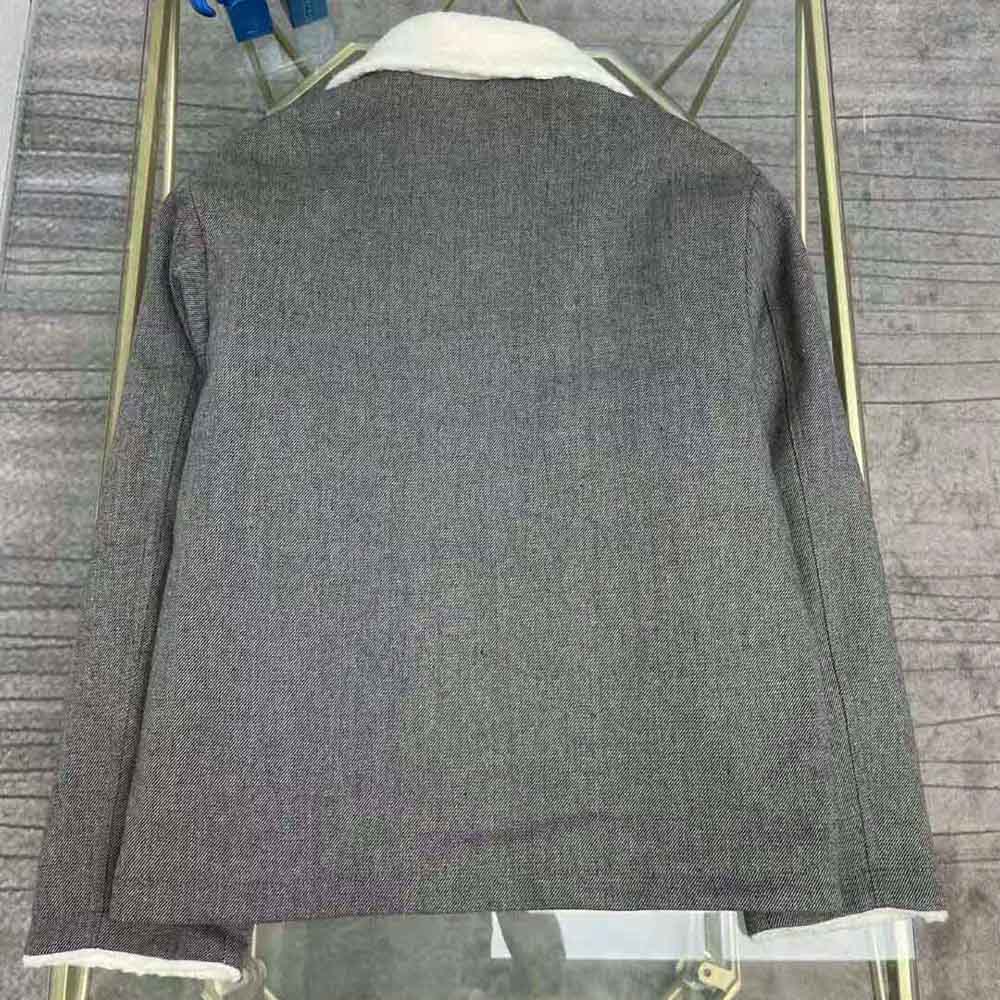 Side angle showing cropped fit of Dior Women Faux-Shearling Caro Jacket