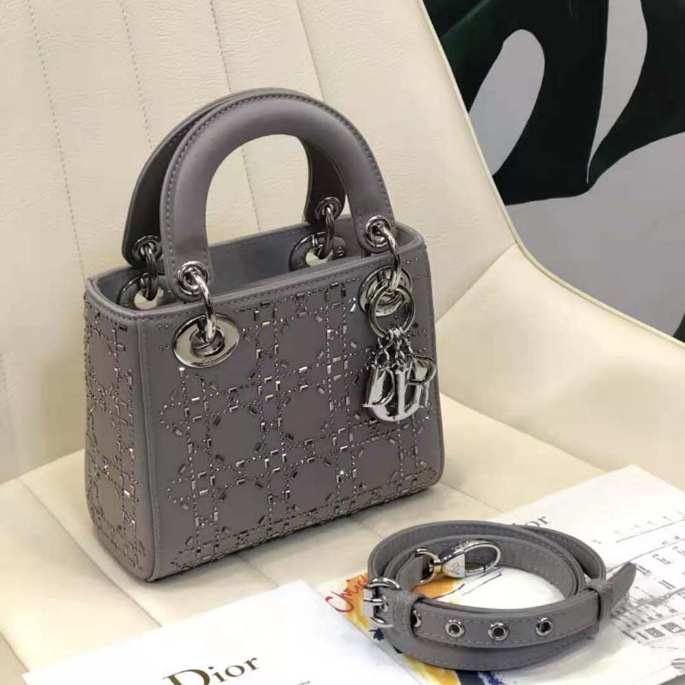 Close-up of satin and strass detailing on Dior Women Mini Lady Dior Bag