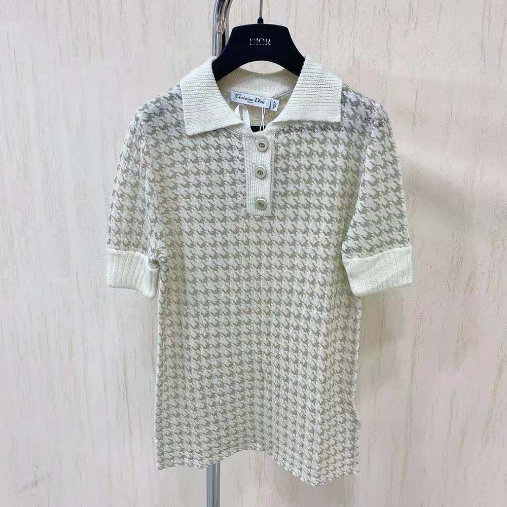 Close-up of gold-tone jacquard pattern on Dior short-sleeved sweater