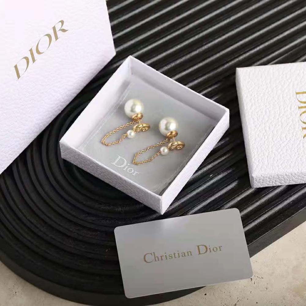 Close-up detail of white resin pearls on Dior Women Tribales Earrings