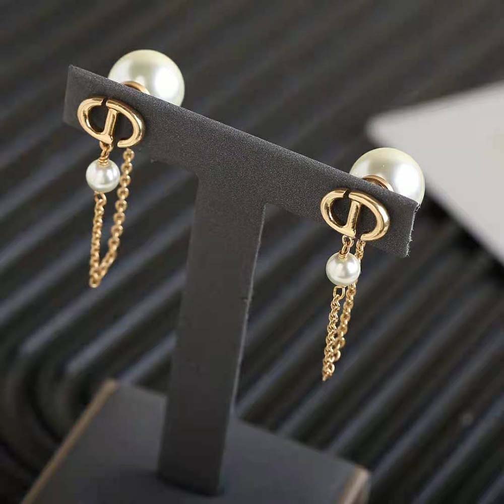 Side angle showing double-sided silhouette of Dior Women Tribales Earrings
