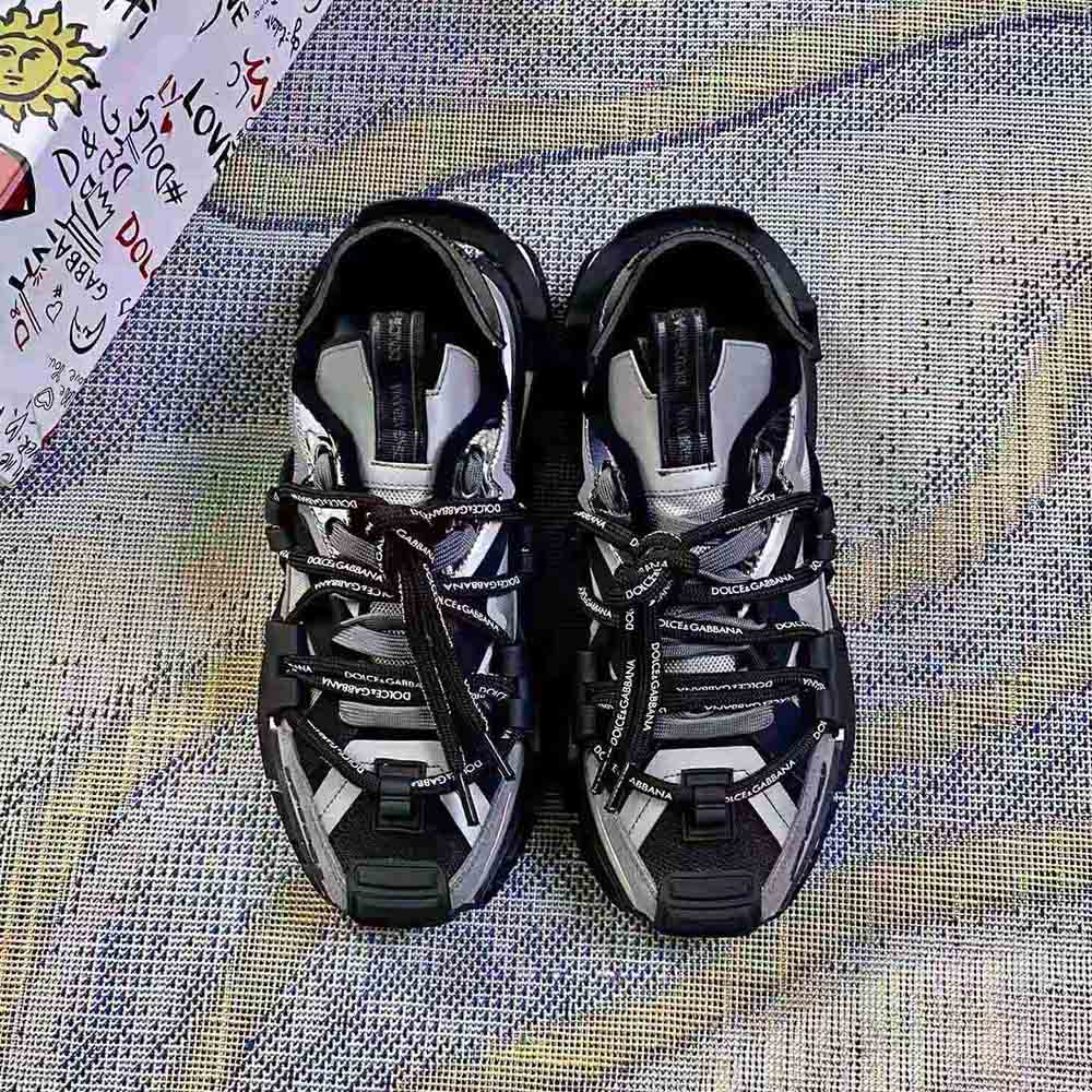 Close-up of blue leather and silver mesh on Dolce Gabbana D&G sneakers