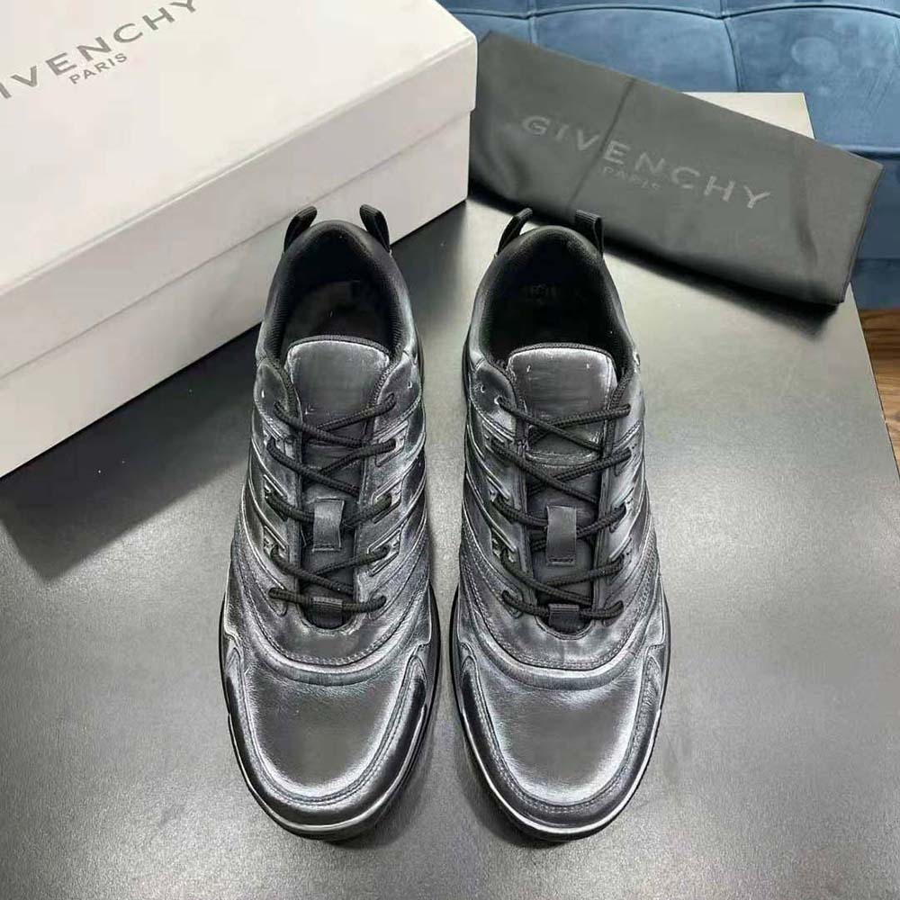 Close-up of tag-effect print detail on Givenchy Men Giv 1 Sneakers black leather