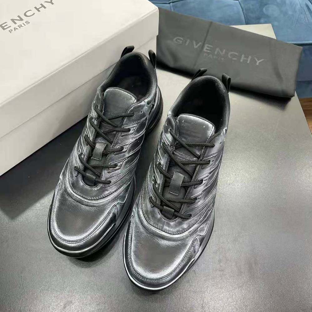 Overhead view showing laces and silhouette of Givenchy Men Giv 1 Sneakers black