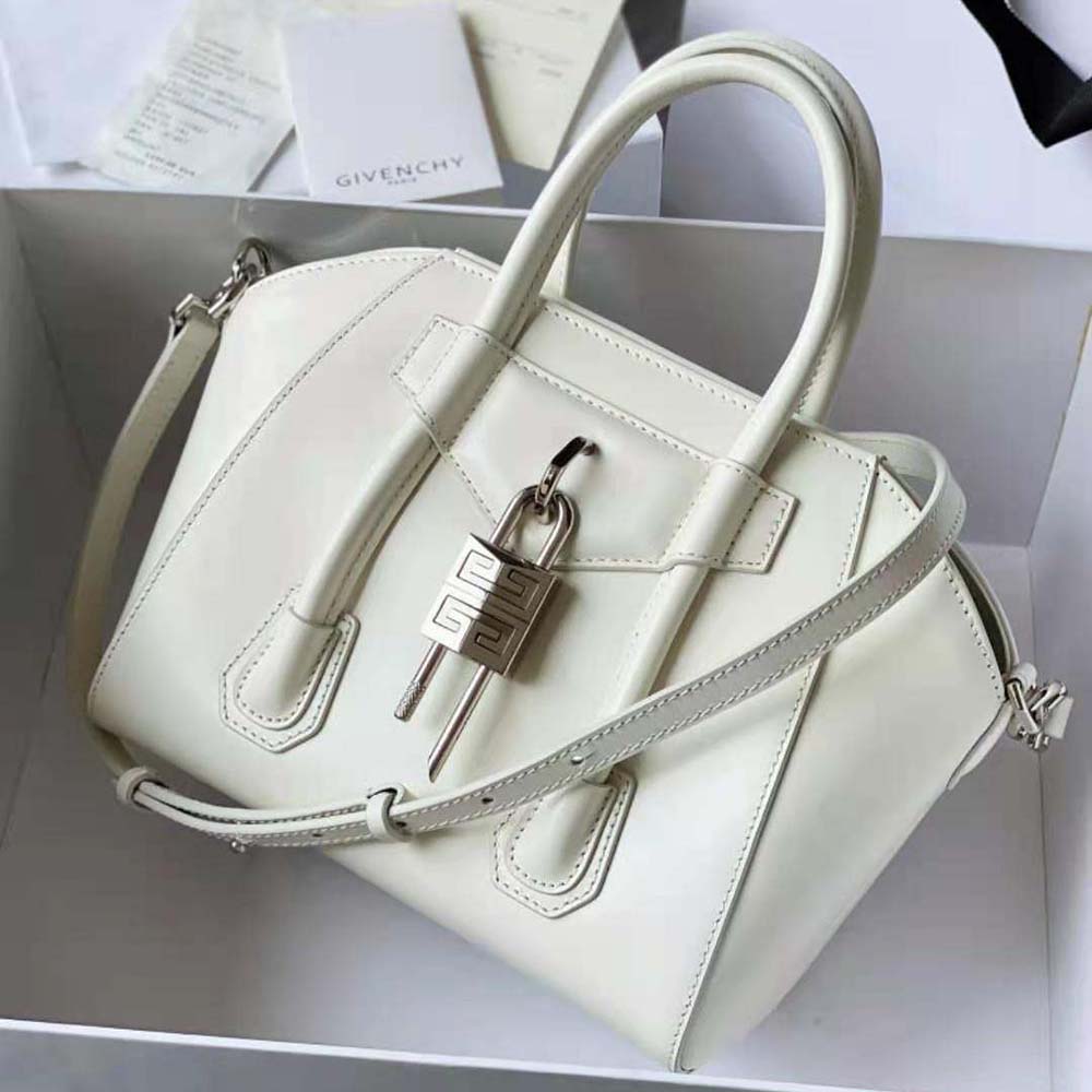 Close-up of silver lock detail on Givenchy Women Mini Antigona Lock Bag in Box Leather-White