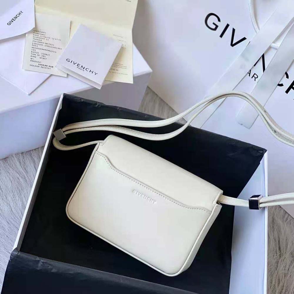 Side profile showing strap and sleek shape of Givenchy Women Small 4g Bag in Box Leather-White