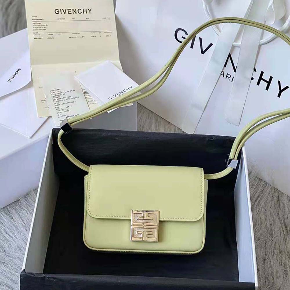 Close-up of aqua box leather and signature hardware on Givenchy Small 4g Bag