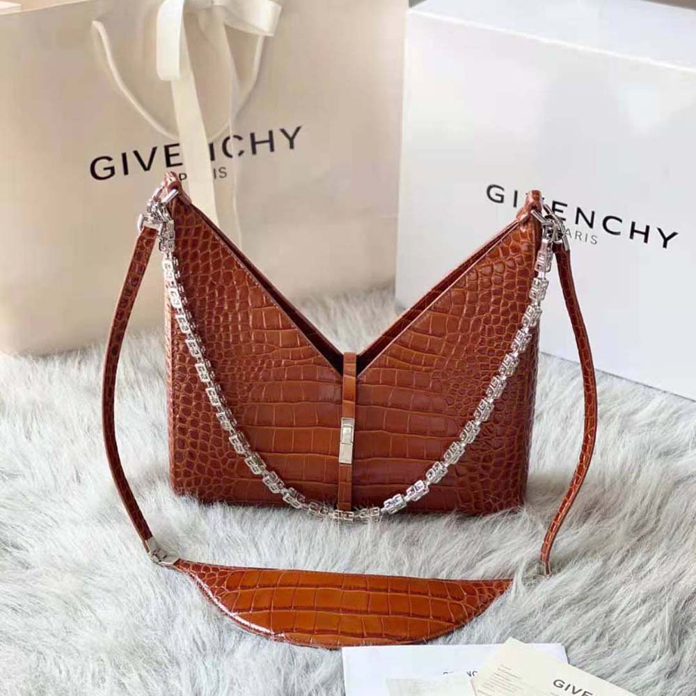 Close-up of chain strap and crocodile texture on Givenchy Small Cut Out Bag