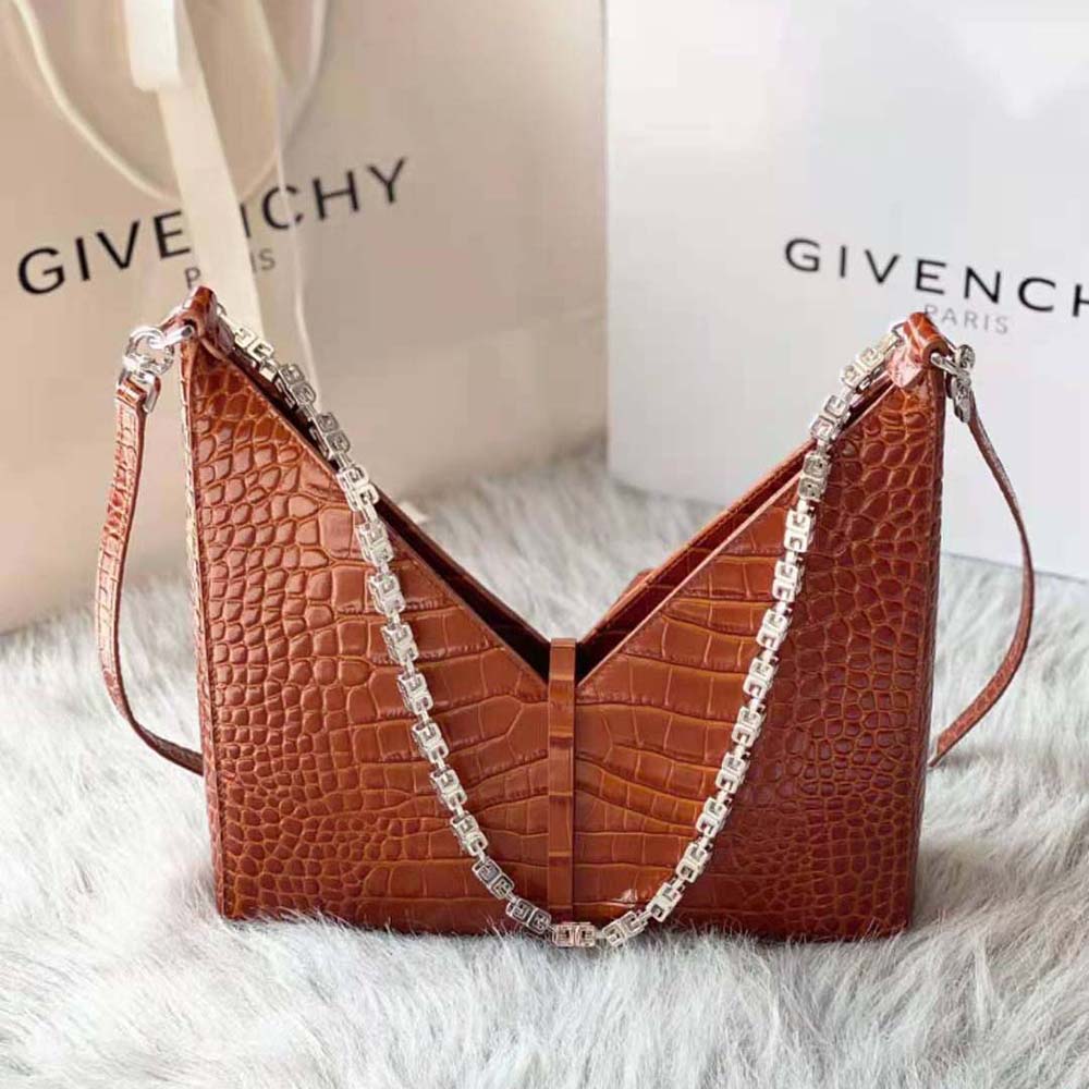 Side profile showcasing silhouette and cut-out detail of Givenchy Women Small Cut Out Bag
