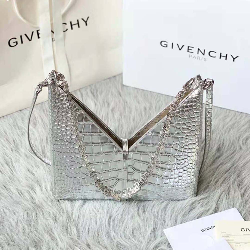 Side angle showing structured silhouette of Givenchy Women Small Cut Out Bag