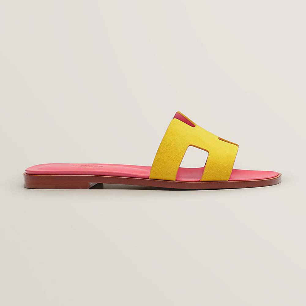 Side view of Hermes Women Oran Sandal in Pink suede goatskin