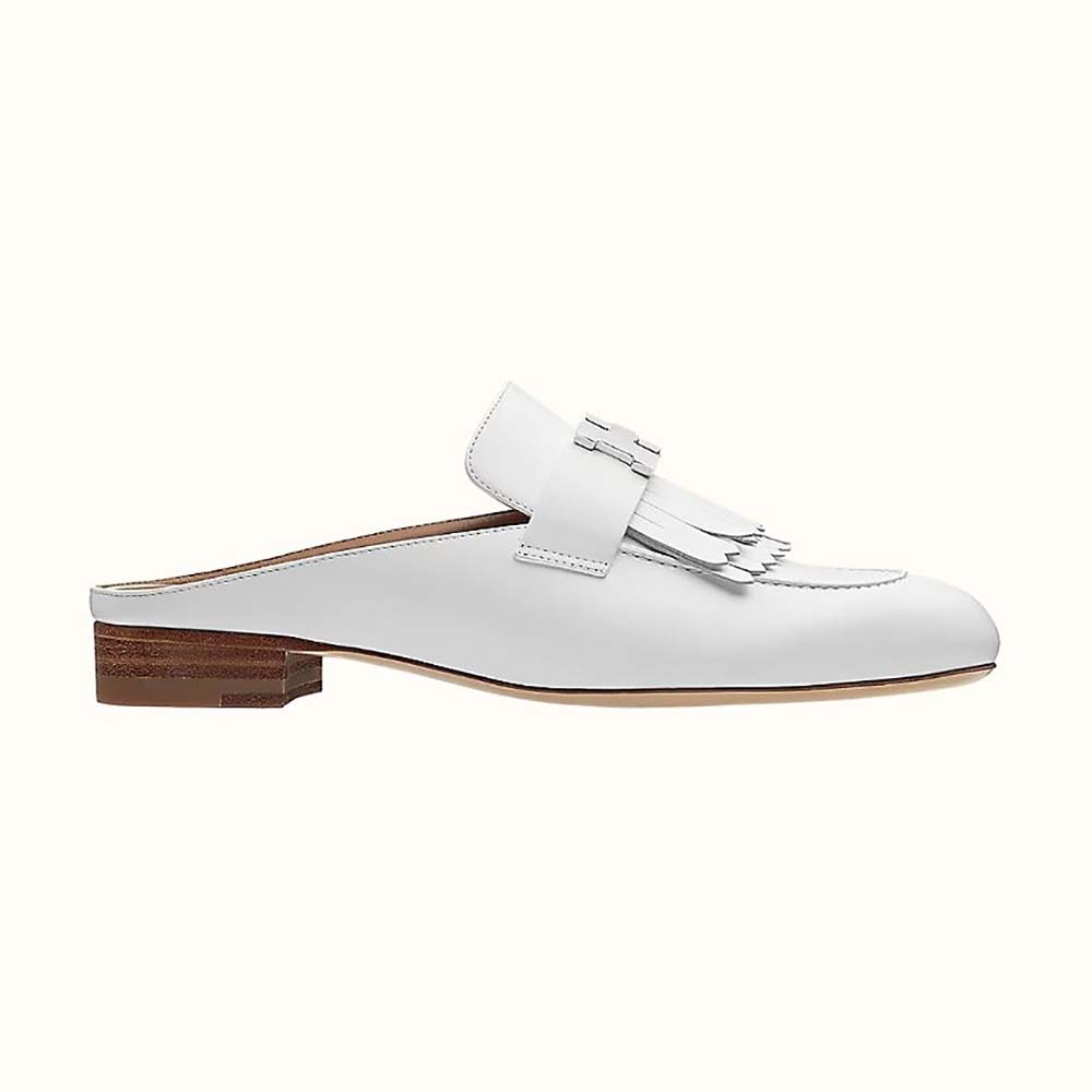 Side profile of Hermes Women Rivoli Mule Mule in Calfskin with Fringe Detail-White