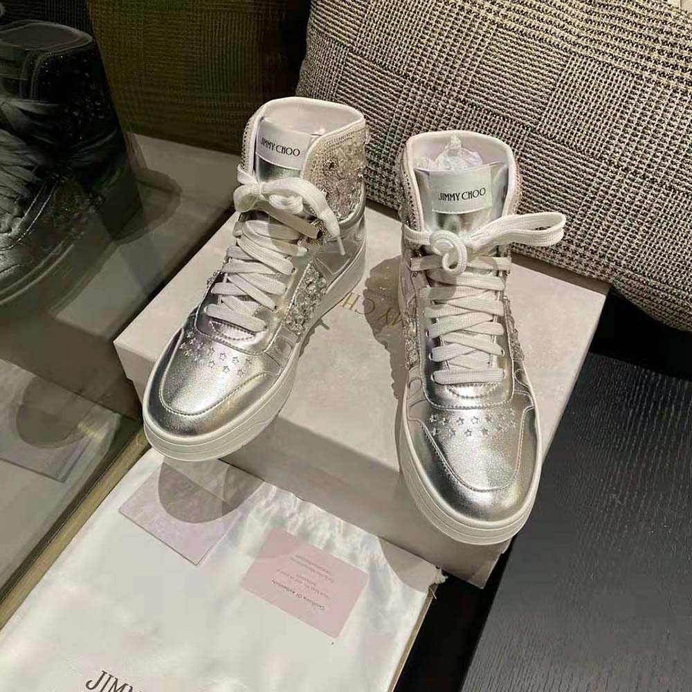 Top-down angle showing laces and padded collar of Jimmy Choo high-top trainers