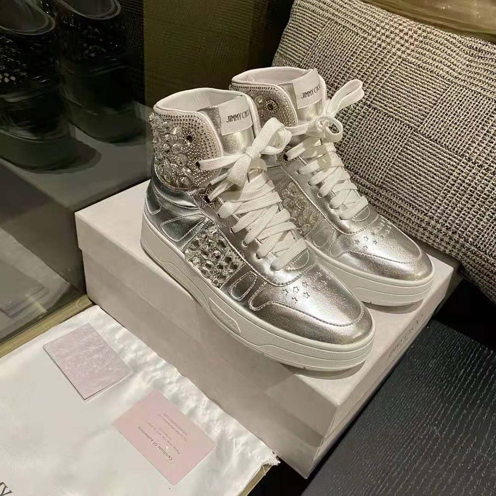 Close-up on silver metallic nappa leather and signature hardware detail