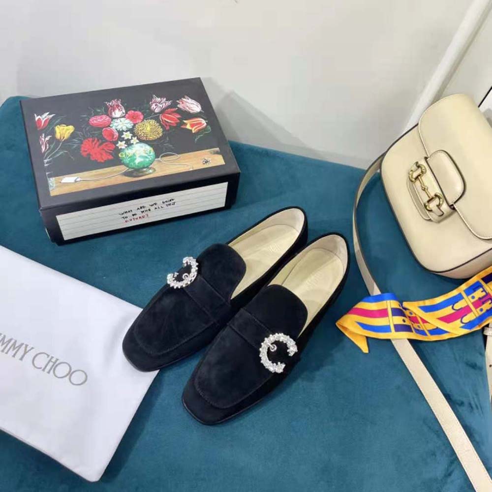 Top view showcasing sleek silhouette of Jimmy Choo Women Mani Black Suede Loafers