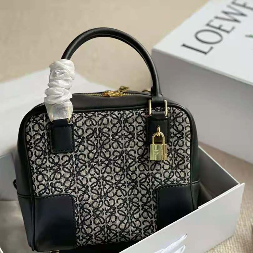 Close-up of black calfskin and jacquard fabric on Loewe Women Amazona 19 Square Bag