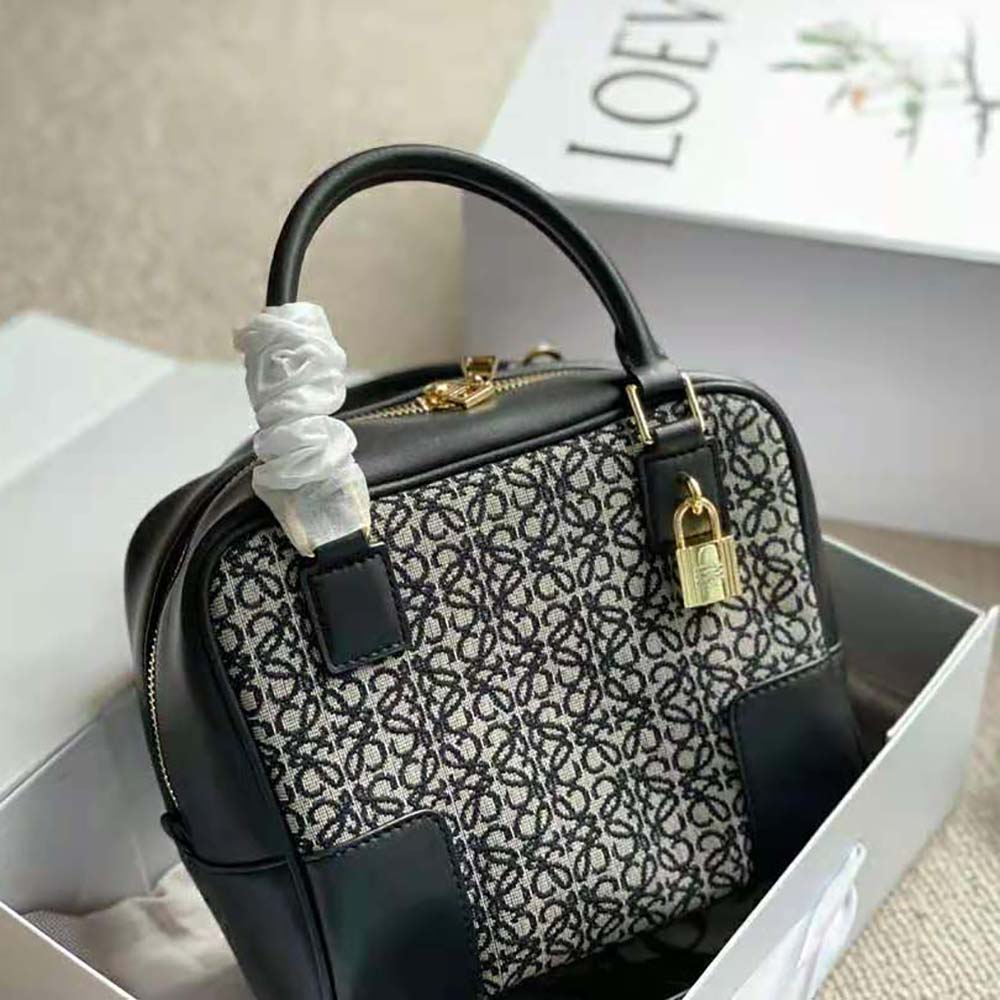 Side angle showing gold-tone hardware on Loewe Women Amazona 19 Square Bag
