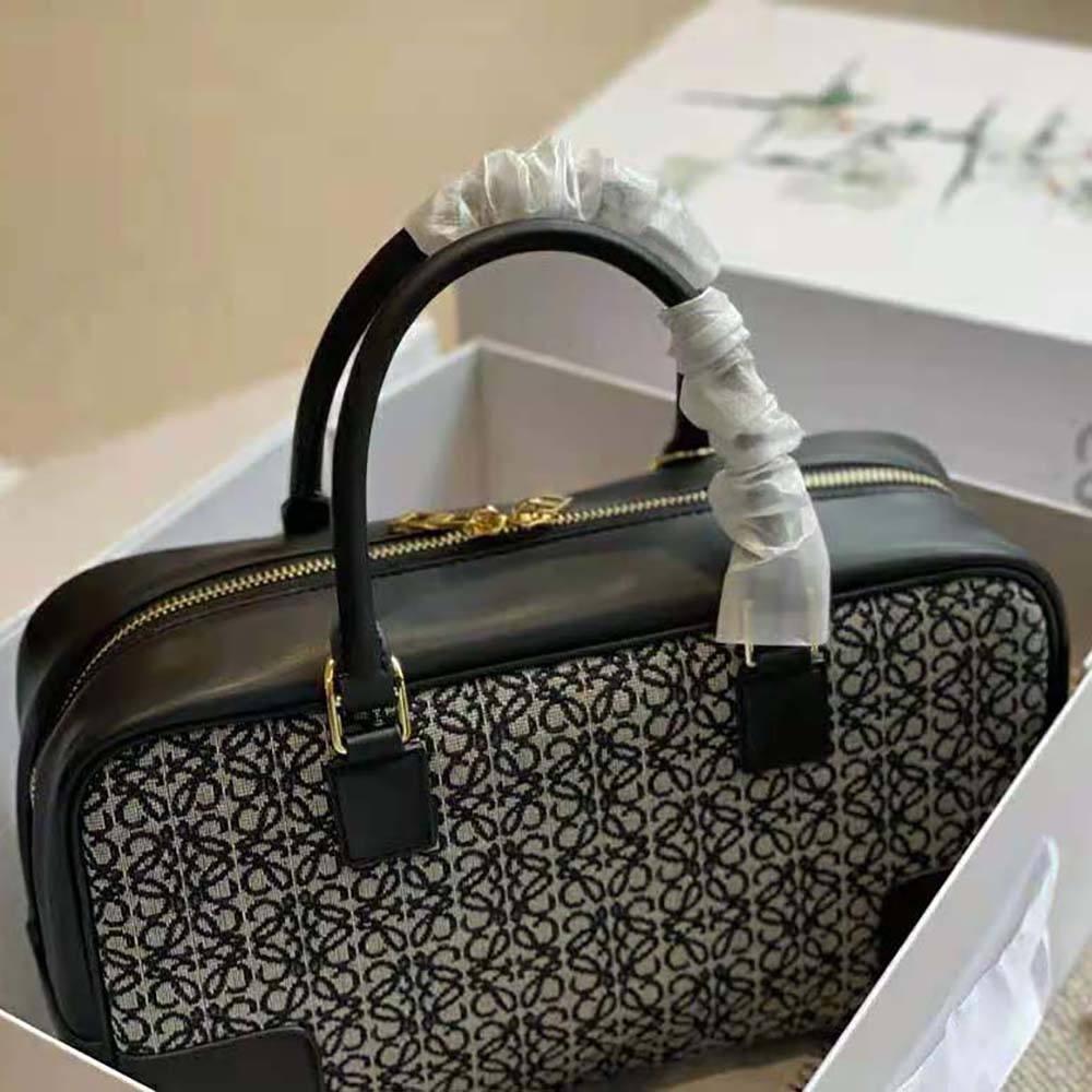 Side profile showing brushed-gold hardware on Loewe Women Amazona 23 handbag