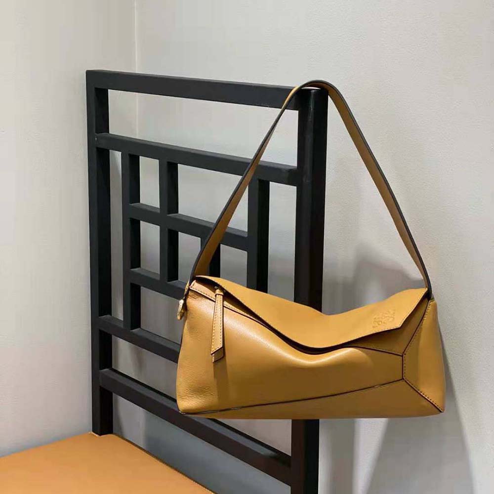 Close-up detail of signature Puzzle stitching on Loewe brown hobo bag